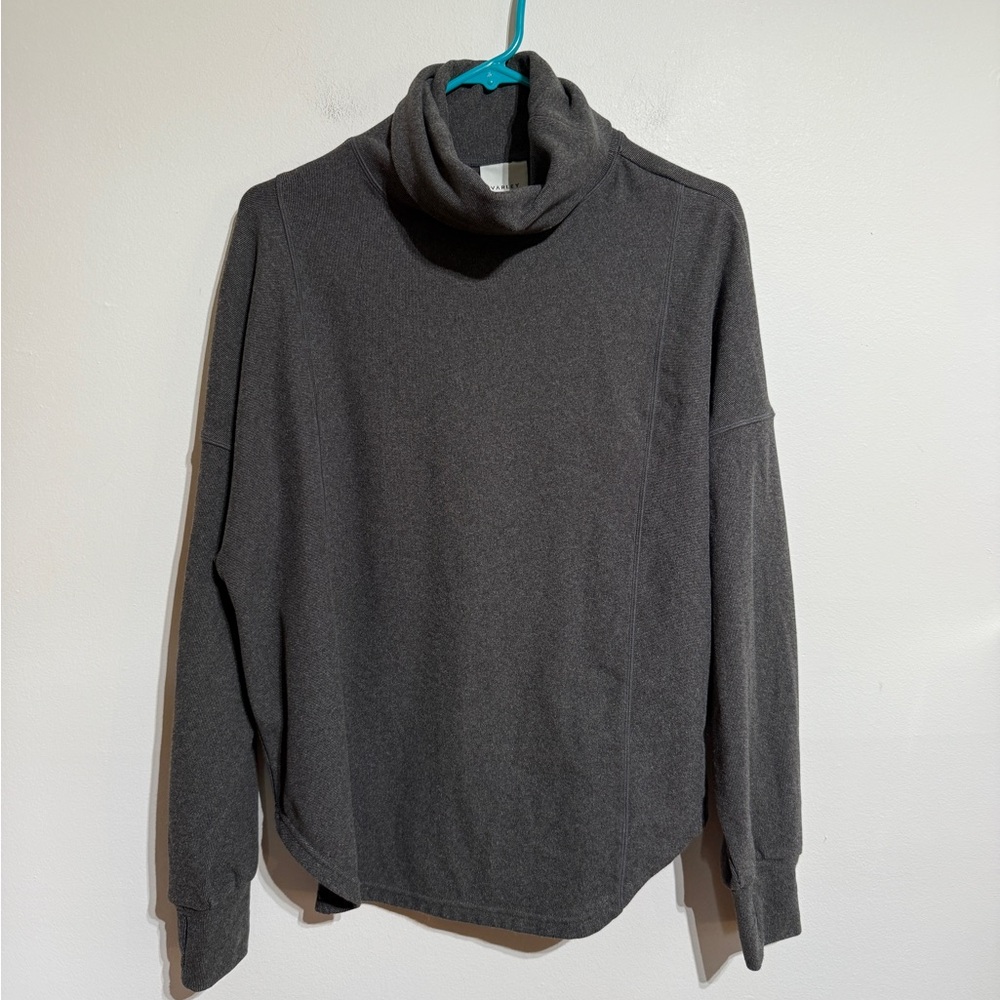 Like new Varley performance funnel neck sweater, small